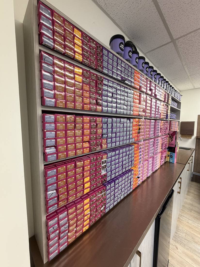 Full color inventory wall at Maria Hair Design Dieppe NB
