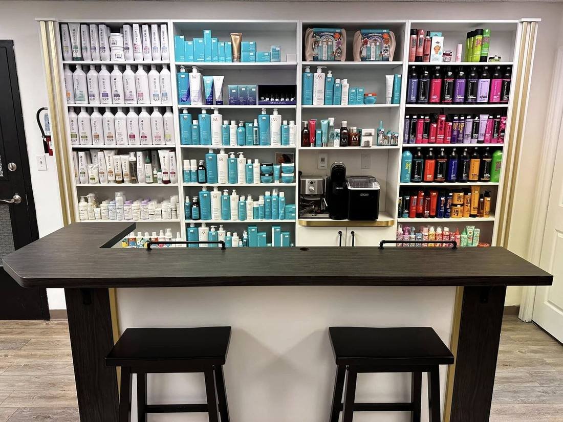 Moroccanoil, Matrix, and Biolage product wall at Maria Hair Design Dieppe NB